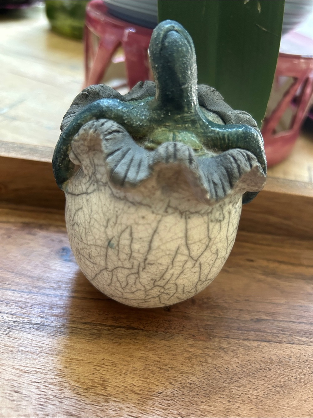 Handcrafted Raku Pottery Made in Hawaii. It is a baby green sea turtle